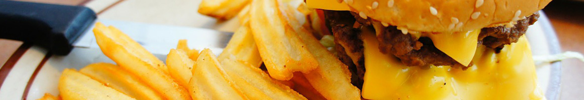 Eating Burger at Juicy Burger restaurant in Bakersfield, CA.